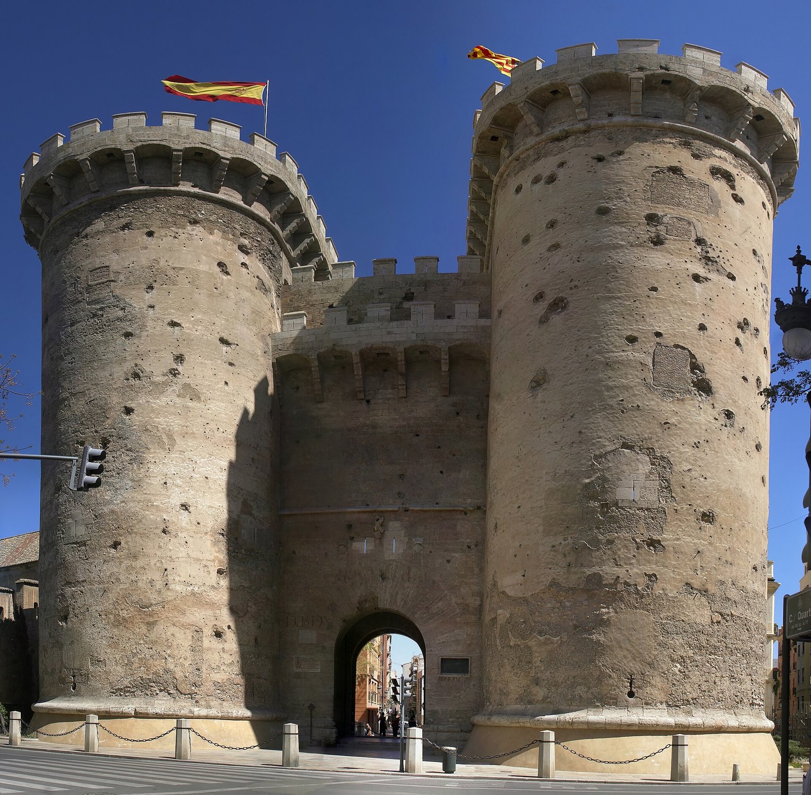 The medieval Torres de Quart against a blue sky